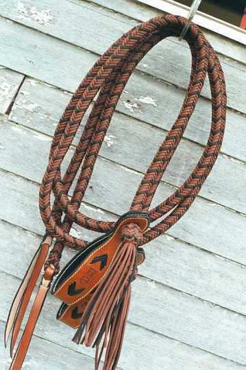 Para reins x16-1.jpg - Black & brown  braided split reins with customised slobber straps.
